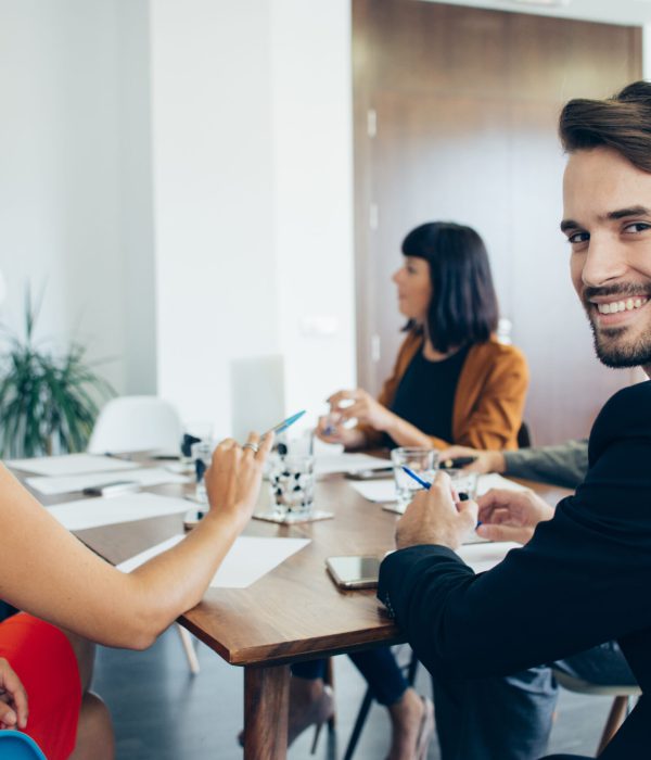 young-businessman-smiling-meeting